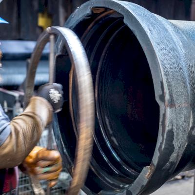 Quality check on the bell end of DI pipe.