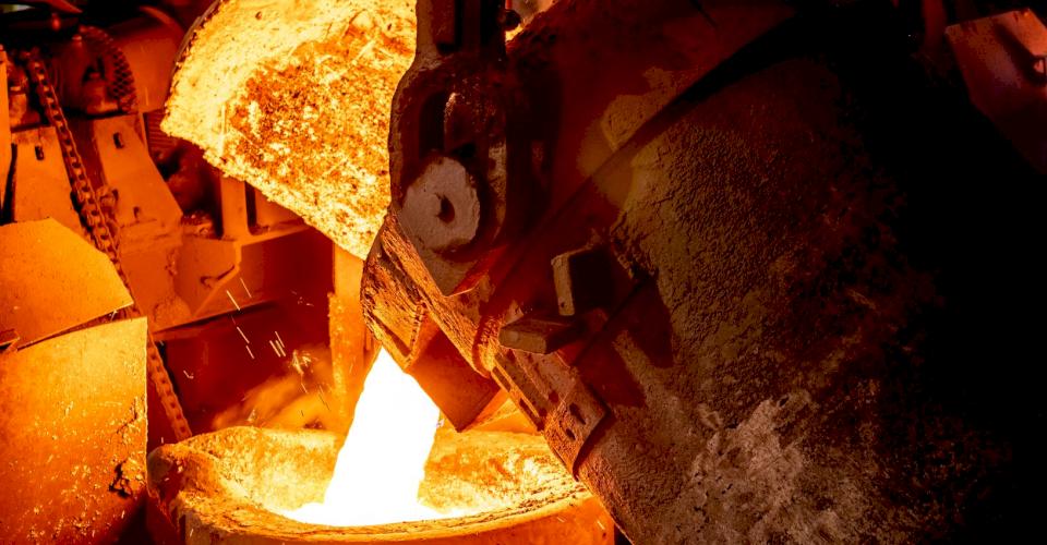Iron being poured into a mold.