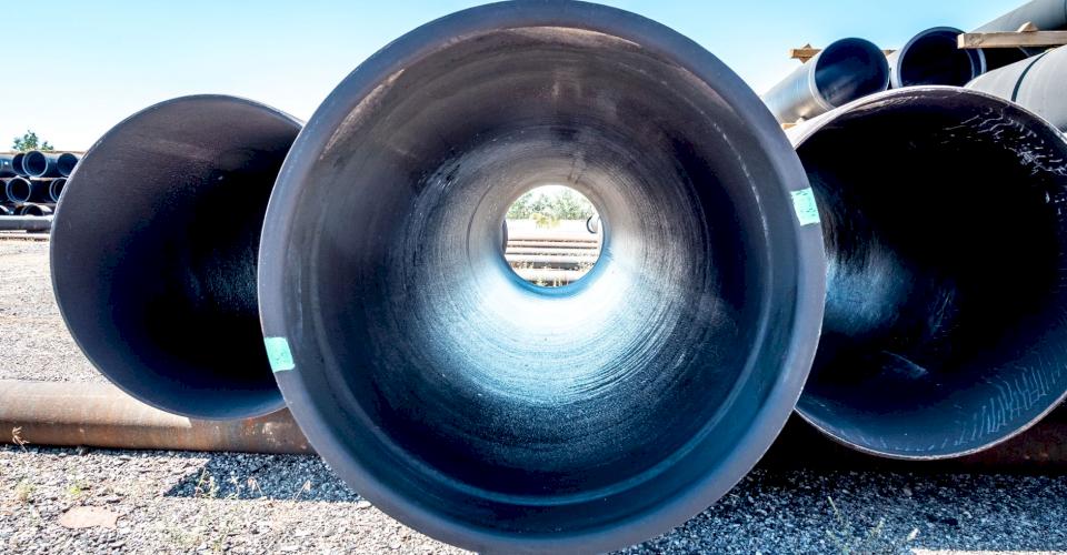 Ductile iron pipe has an inside diameter and an outside diameter that are slightly different.