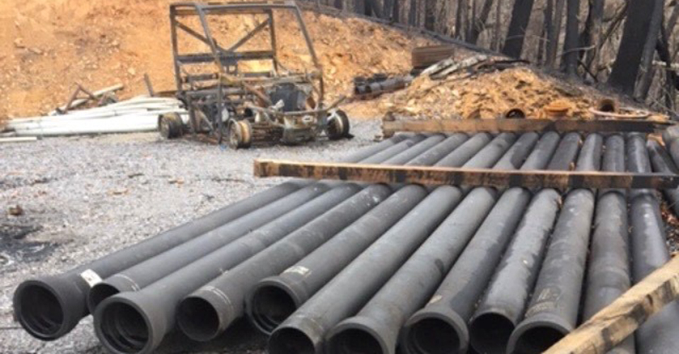 Temperatures from a wildfire in Gatlinburg, TN melted everything in this photo except the temperature resistant Ductile iron pipe, 2017.