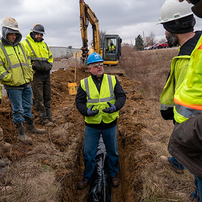 Jerry Regula, McWane Ductile National Product Engineer (center) conducts on-site job training in Massillon, Ohio.