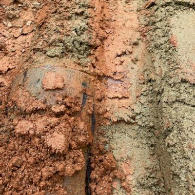 Look for clues such as water accumulating at the surface of a buried line.