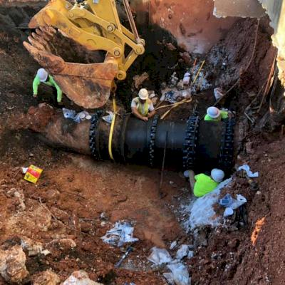 Piecing together the new Ductile iron pipe.